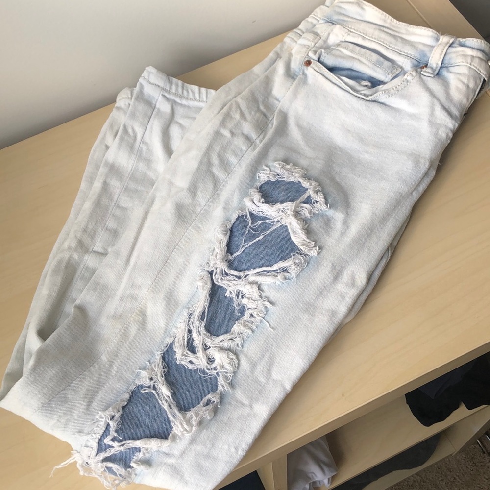 Distressed light wash jeans